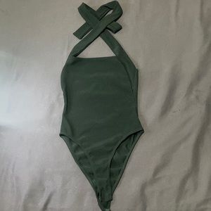 Pretty little thing cross over body suit.